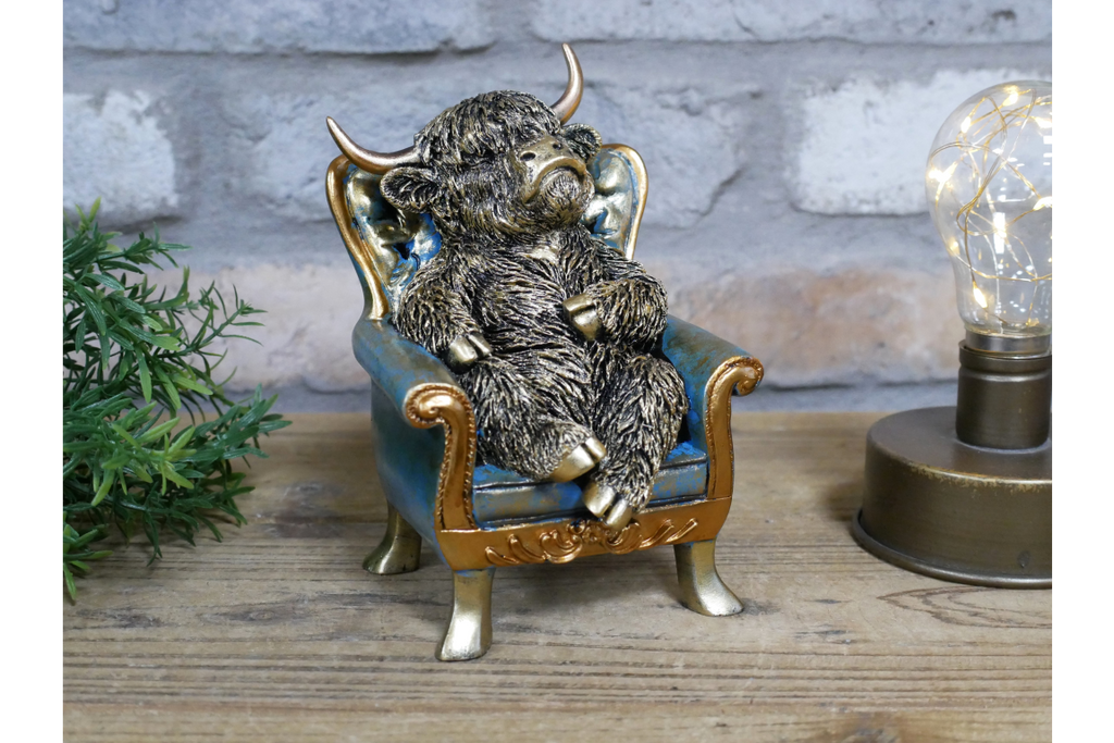 Highland Cow on a Chair