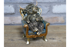 Highland Cow on a Chair