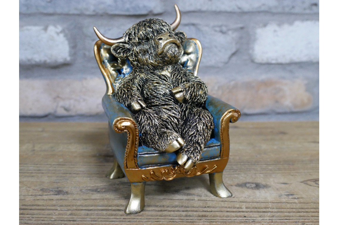 Highland Cow on a Chair