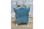 Highland Cow on a Chair