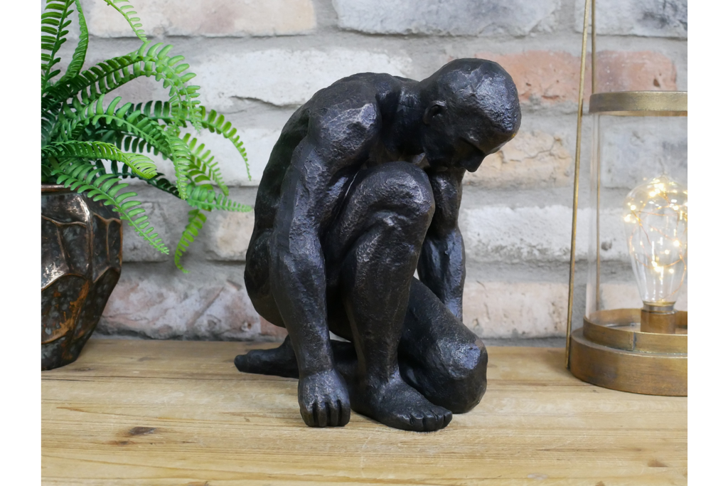 Kneeling Man