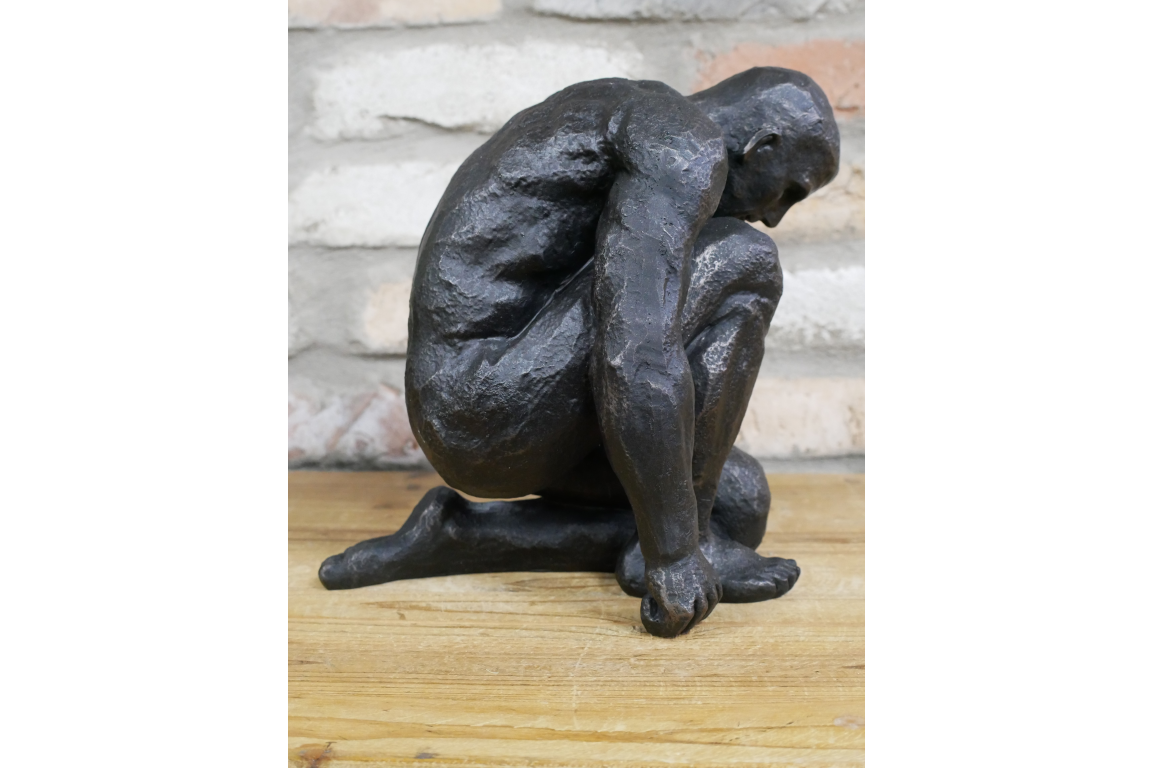 Kneeling Man