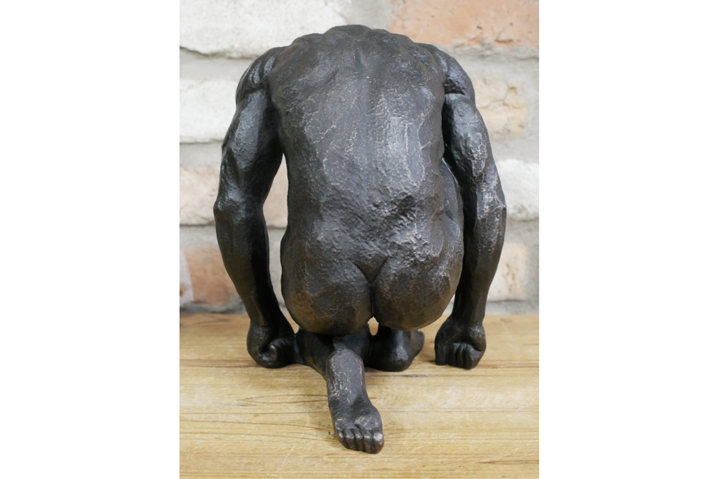 Kneeling Man