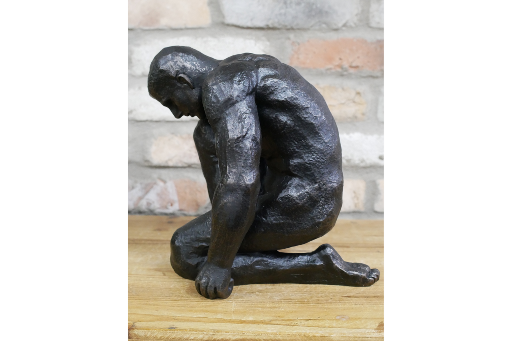 Kneeling Man